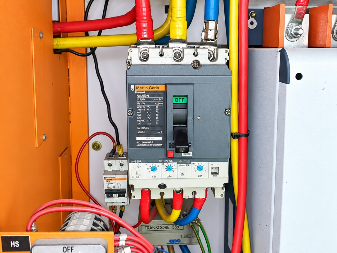 Newly refurbished MCC section wired by GTEP Engineering, showing the main breaker and colour-coded power cabling
